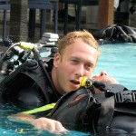 IDC candidate performing a breathing check during diver rescue practice